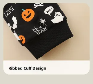 Dettaglio dei polsini a costine sui pantaloni di Halloween per bambini con zucche