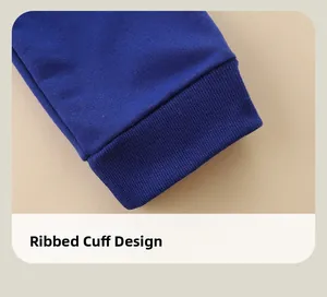 Detailed view of dark blue ribbed ankle cuffs on high-density cotton boys' joggers
