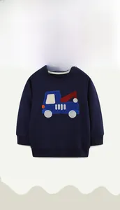 Detail of cartoon truck embroidery on navy blue cotton sweatshirt for boys