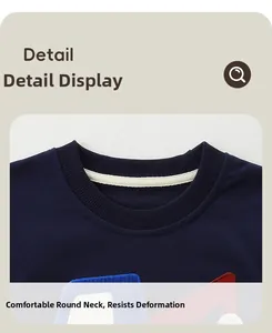 Detail view of the ribbed round neckline and reinforced neck tape on navy blue boys sweatshirt