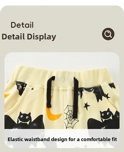 Detail view of boys' Halloween pants showing elastic waistband and spooky theme patterns