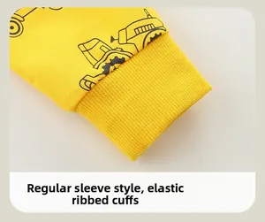 Detail of yellow toddler sweatshirt sleeve with elastic ribbed cuffs and car print