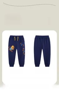 Detail of navy blue kids sweatpants with cartoon lion embroidery and drawstring waist