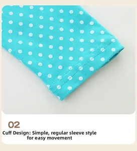 Detail of blue polka dot sleeves with durable double-needle stitching for girls' dresses