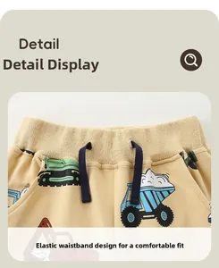 Détail du jogging garçon avec taille élastique, cordon de serrage et imprimé camion