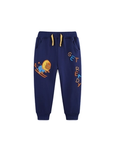 Navy blue kids joggers with lion embroidery and yellow drawstring on white background