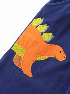 Pantalon en maille bleu marine pour garcon avec broderie dinosaure orange vif
