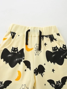 Kids Halloween sweatpants with bat and moon prints, elastic waist and black drawstring