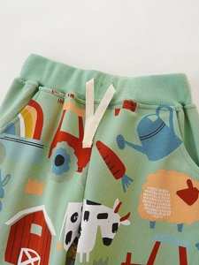 Kids mint green jogger pants with cartoon farm print and adjustable drawstring waist