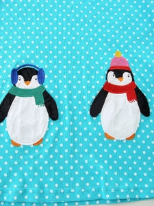 Blue polka dot girls dress with cute cartoon penguin embroidery and fabric patch