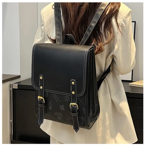 Vue arrière d'un sac à dos vintage en cuir PU noir avec imprimé Teddy Bear et surpiqûres blanches