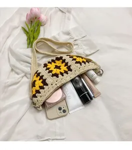 Interior view of sunflower crochet bag showing ample space for phone and makeup