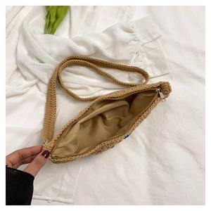 Close-up of bohemian crochet bag showing secure silver zipper and smooth inner lining