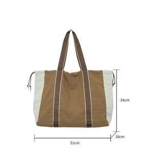Detailed size chart showing dimensions of the large earth-tone tote bag with 51cm width