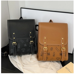 Détails de sacs à dos vintage à imprimé ours en noir et marron avec coutures blanches