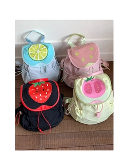 Detail view of four lightweight nylon drawstring backpacks with 3D fruit designs