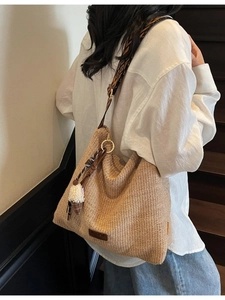 Bohemian hand-woven straw tote bag with geometric ethnic shoulder strap and ice cream charm