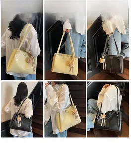 Collage of model carrying large crocodile pattern tote bags in beige and black colors