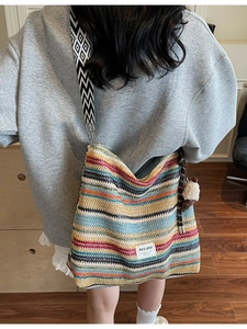 Bohemian colorful striped woven crossbody beach bag with a wide geometric shoulder strap