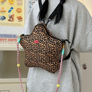 Star-shaped leopard print canvas crossbody bag with trendy colorful woven straps