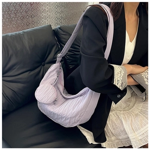 Detail of light purple pleated crescent bag with a matching small round coin purse