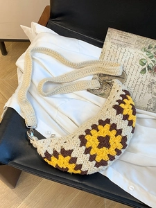 Bohemian crochet crossbody bag with sunflower knit pattern for summer beach vacations
