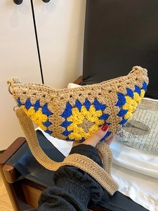 Bohemian crochet hobo bag featuring sunflower embroidery and wide shoulder strap for vacation