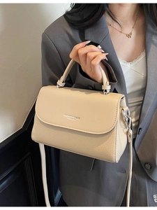 Chic beige lychee pattern leather handbag with flap and crossbody strap for women