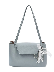 Blue lychee pattern tote bag with white lace bow and pearl pendant on white background
