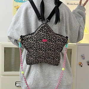 Star-shaped leopard print backpack with colorful ropes and trendy street style design
