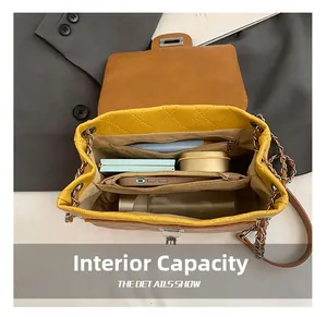 Detail view of the spacious internal capacity with multiple compartments and zipper pockets
