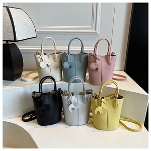 Detailed display of fashionable leather bucket bags in six colors with elephant charms