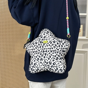 Star-shaped crossbody bag with leopard print and multi-color braided shoulder strap