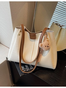 Off-white crocodile texture tote bag with brown straps and cute bear charm pendant