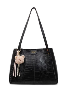 Minimalist black crocodile pattern tote bag with teddy bear charm and gold logo detail