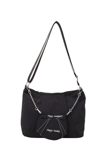 Large black canvas tote bag with Happy Sunday print and heart-shaped pendant accessory