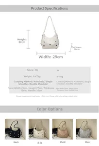Detailed view of large PU shoulder bag with metal butterfly and adjustable straps