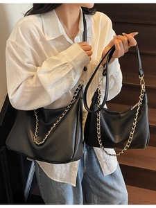 Retro black leather tote bag set with gold chain strap for women, casual crossbody style