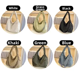Quilted canvas tote bags in six colors including white, khaki, green, and blue