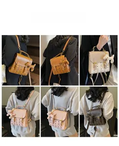Detail showing various colors of monogram mini backpacks with cute plush puppy charms