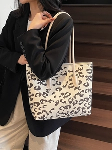 Large leopard print tote bag with slim double handles for casual commuting