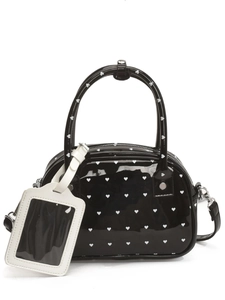 Elegant black patent leather bowling bag with white heart patterns and crossbody strap