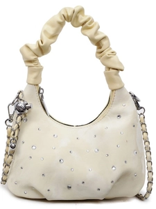 Beige pleated dumpling bag with rhinestones, silver chain strap, and ball pendant