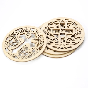 Laser-cut wooden coasters with Celtic knot and cross design for table decoration