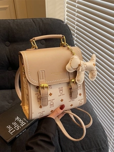 Vintage bear print mini backpack in beige and coffee leather with a dog charm