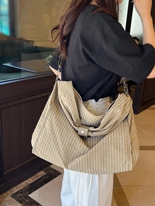 Large checkered canvas tote bag with brown leather strap and chain for women
