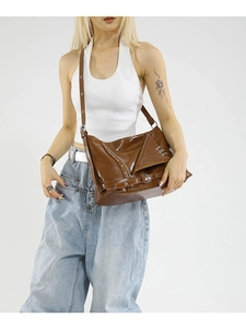 Brown glossy motorcycle style tote bag with metal zippers and buckles for women