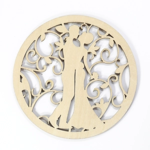 Detailed laser-cut circular wooden wedding ornament featuring a romantic couple silhouette