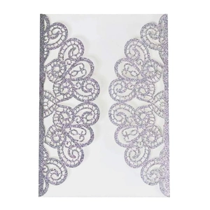 Elegant purple glitter laser-cut invitation sleeve with intricate floral scroll patterns