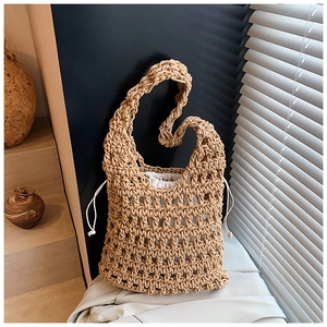 Close-up of knit hollow tote bag showing cotton crochet texture and drawstring liner